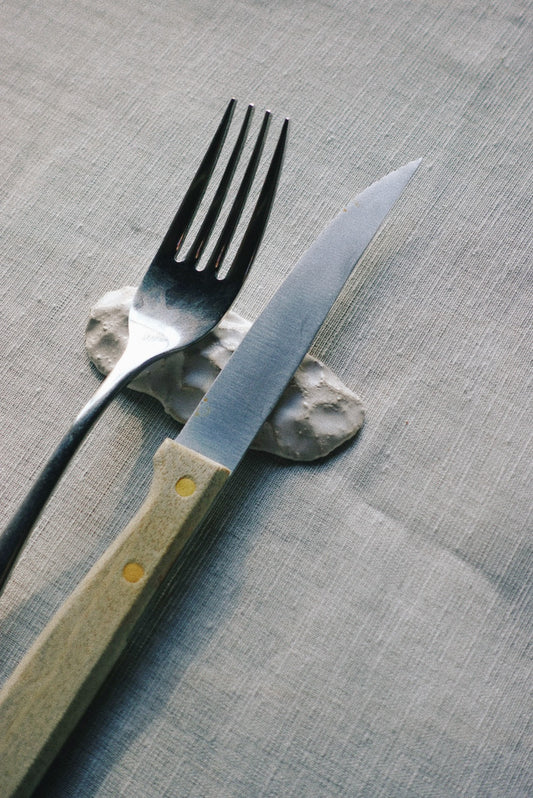 Stone cutlery rests