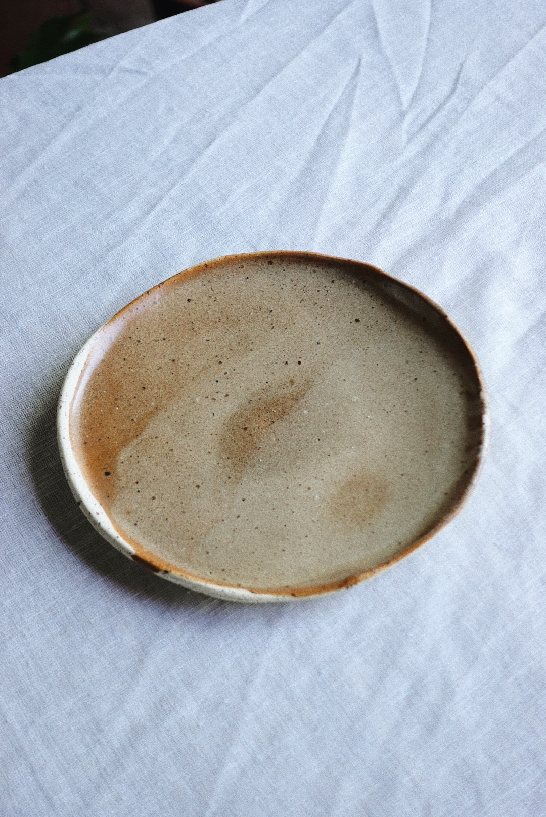 Brown speckled earth dessert plate