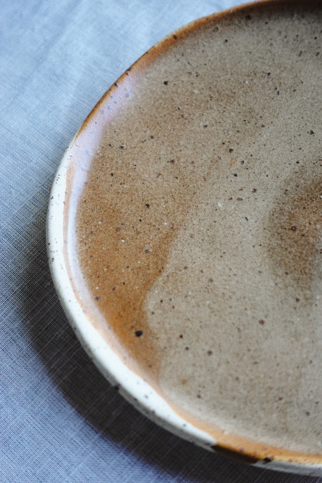Brown speckled earth dessert plate